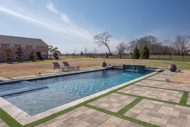 view of swimming pool featuring a yard, a patio area, fence, and a fenced in pool