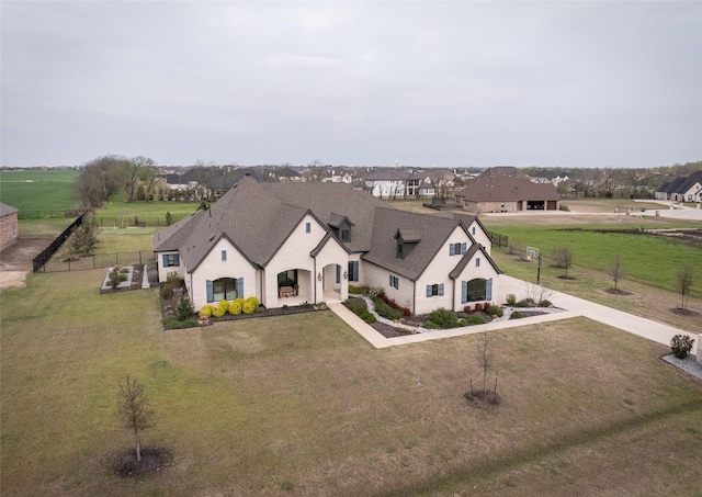 910 Greenacres Ln, Lucas, TX 75002 - view of front facade featuring a shingled roof, a front yard, fence, and a rural view