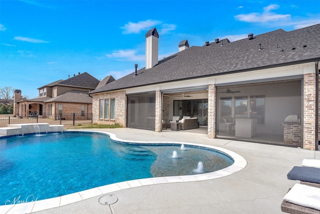 view of swimming pool with ceiling fan, fence, an outdoor living space, a fenced in pool, and a patio area