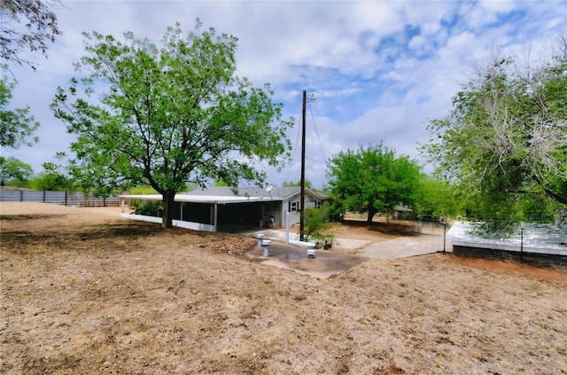 view of yard with fence