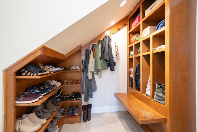 mudroom featuring tile patterned flooring and baseboards