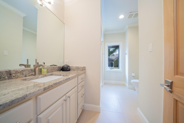 bathroom featuring visible vents, baseboards, toilet, ornamental molding, and vanity