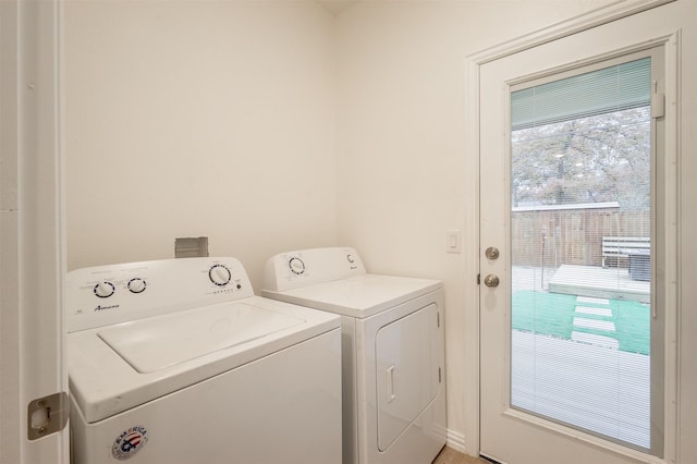 laundry room with laundry area and washing machine and dryer