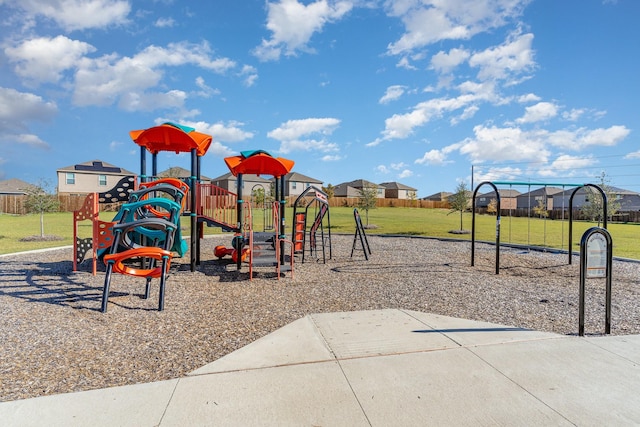 community playground with a lawn