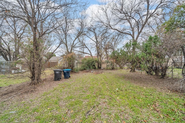 view of yard with fence