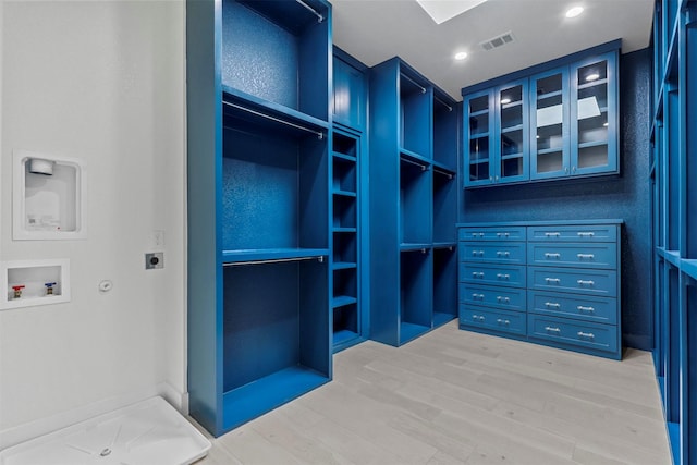 spacious closet with visible vents and light wood finished floors