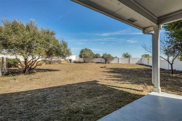 view of yard with a fenced backyard