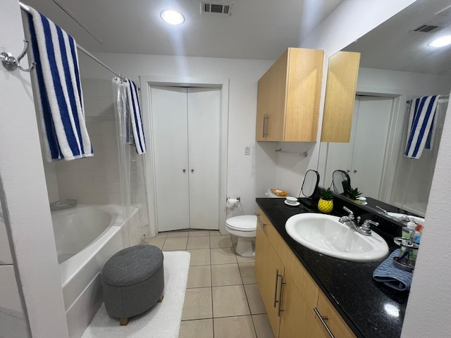 full bath featuring toilet, vanity, visible vents, and tile patterned floors