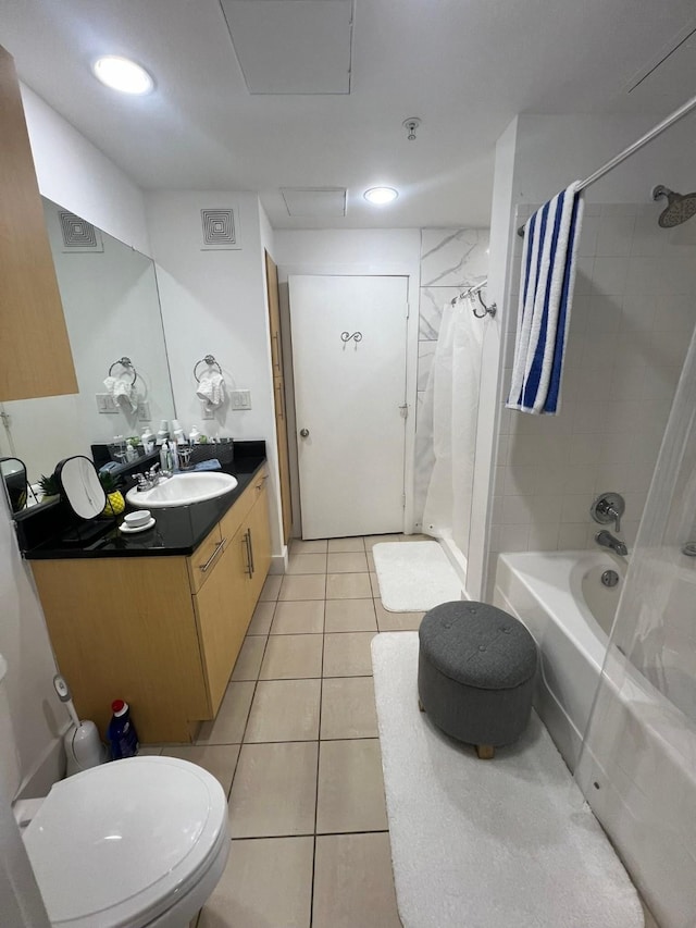 bathroom with shower / tub combo, visible vents, toilet, tile patterned floors, and vanity