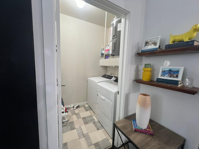 laundry room with laundry area and washer / dryer