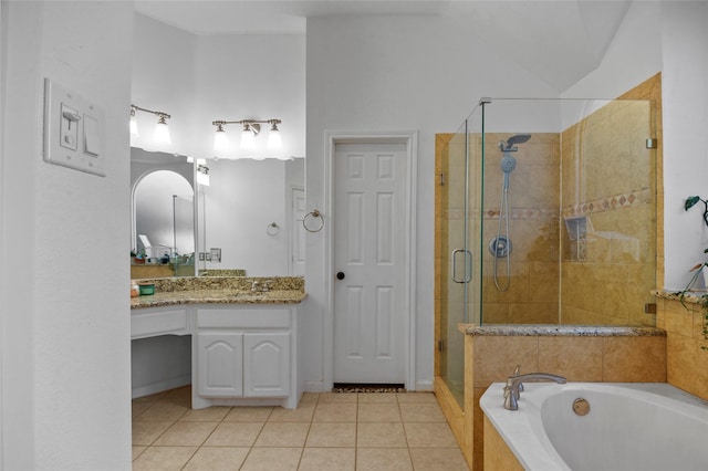 full bathroom featuring tile patterned floors, vaulted ceiling, vanity, a shower stall, and a bath