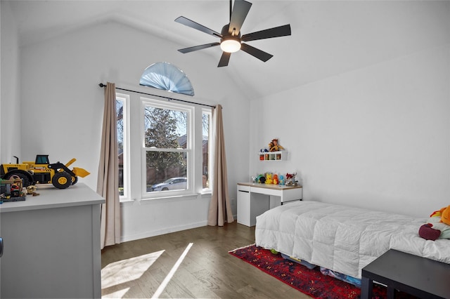 bedroom featuring lofted ceiling, ceiling fan, and wood finished floors