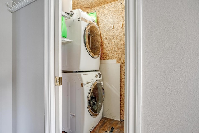 laundry area with laundry area and stacked washing maching and dryer