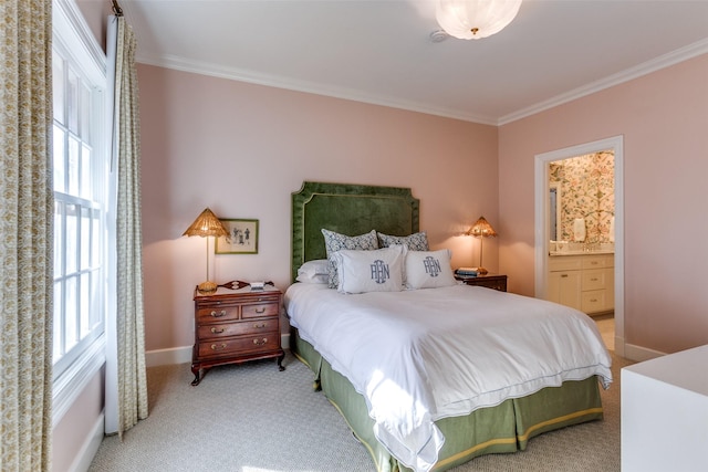 bedroom featuring light carpet, baseboards, and crown molding