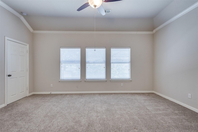 unfurnished room with carpet, visible vents, and a healthy amount of sunlight