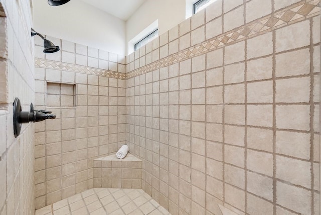 full bathroom featuring a tile shower