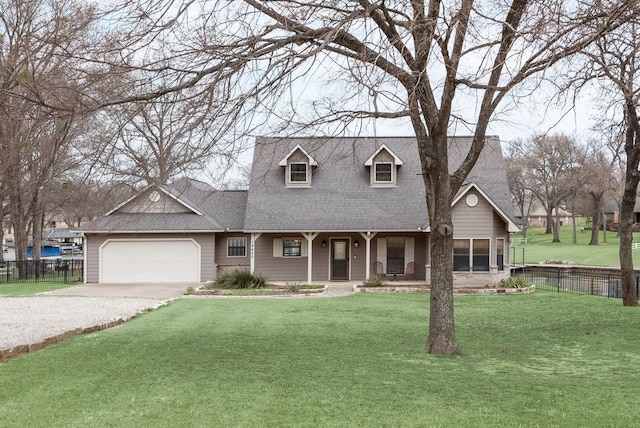 cape cod-style house featuring gravel driveway, a porch, an attached garage, fence, and a front lawn