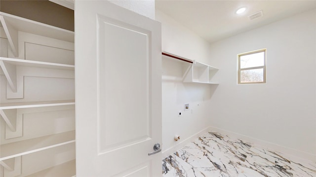 washroom featuring laundry area, visible vents, hookup for a gas dryer, marble finish floor, and electric dryer hookup