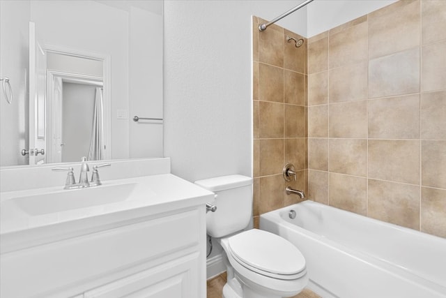 full bathroom featuring  shower combination, vanity, and toilet