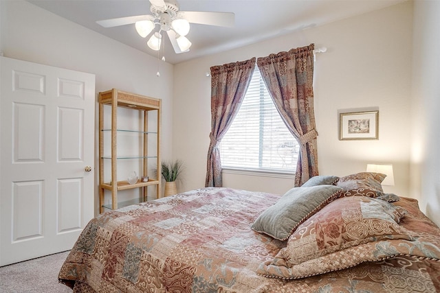 bedroom featuring carpet and a ceiling fan