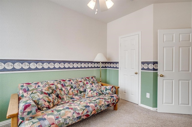 sitting room featuring carpet floors and a ceiling fan