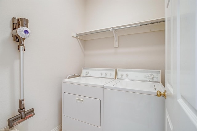 laundry room with laundry area and washer and dryer