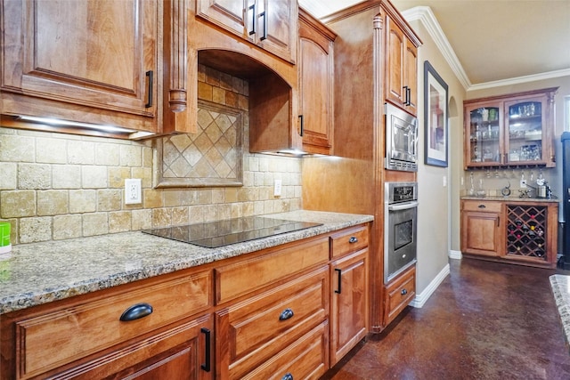 kitchen with decorative backsplash, ornamental molding, light stone countertops, stainless steel appliances, and concrete floors