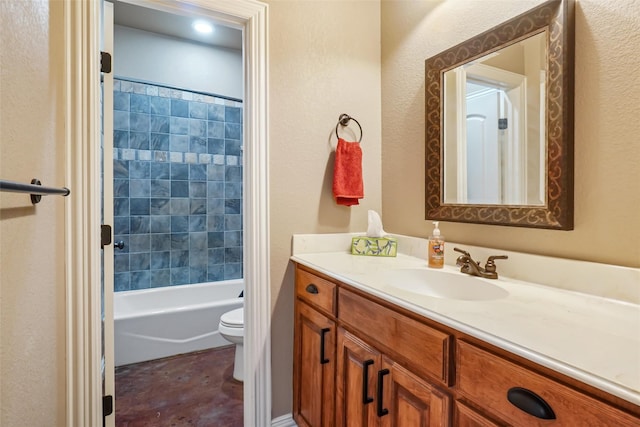 full bathroom with  shower combination, vanity, and toilet