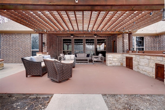 view of patio featuring outdoor lounge area and a pergola