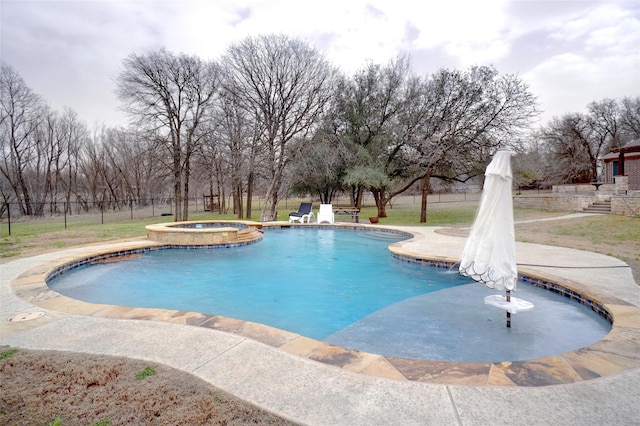 view of swimming pool featuring a fenced in pool, fence, a patio, and an in ground hot tub