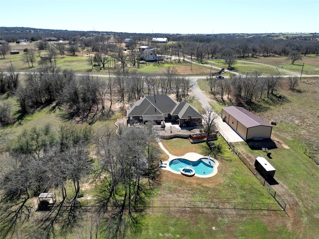 birds eye view of property featuring a rural view