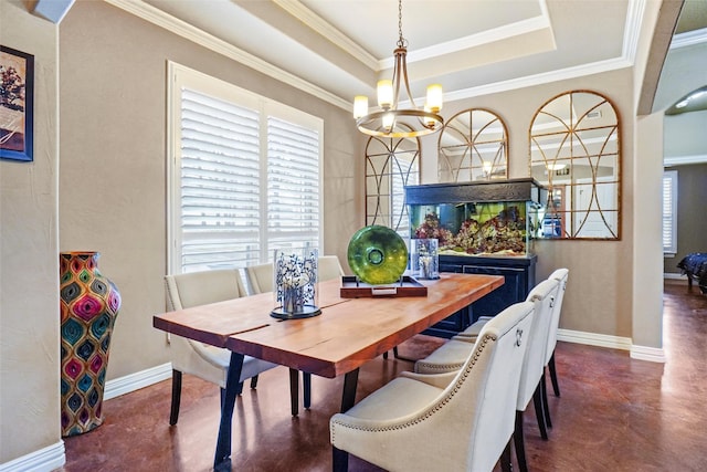 dining area featuring baseboards, a raised ceiling, finished concrete floors, and a notable chandelier