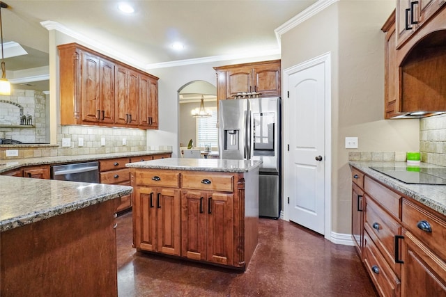 kitchen with stainless steel appliances, light stone counters, backsplash, and crown molding