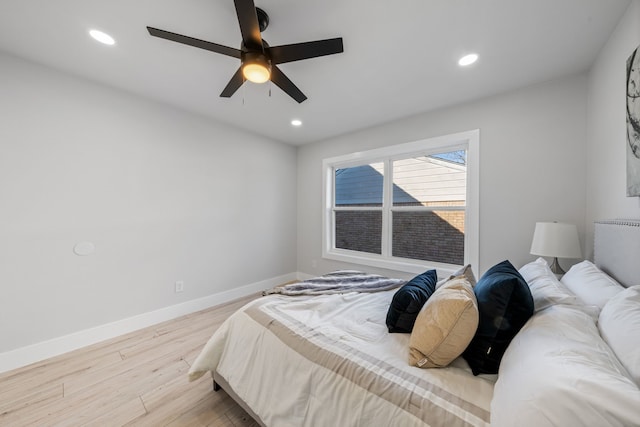 bedroom featuring recessed lighting, ceiling fan, baseboards, and wood finished floors