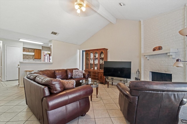 living area featuring a fireplace, light tile patterned floors, visible vents, lofted ceiling with beams, and a ceiling fan