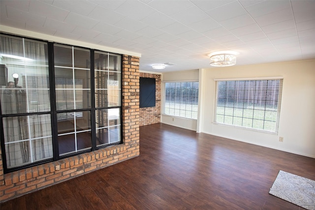 unfurnished room featuring wood finished floors