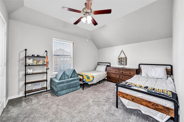 bedroom with lofted ceiling, visible vents, a ceiling fan, baseboards, and carpet