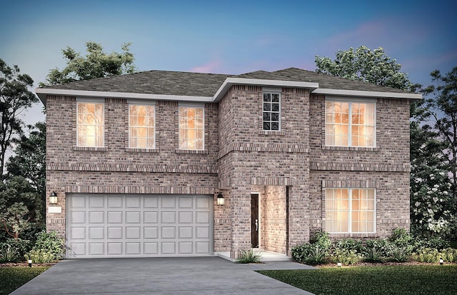 traditional home with a garage, concrete driveway, and brick siding