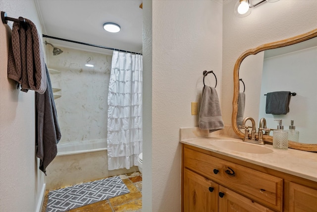 full bathroom featuring shower / tub combo, vanity, and toilet