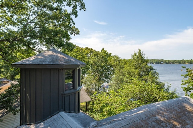 view of outbuilding with a water view