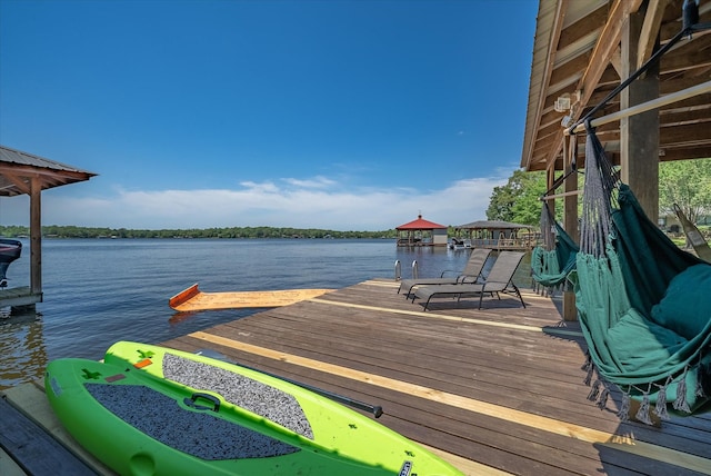 dock area with a water view