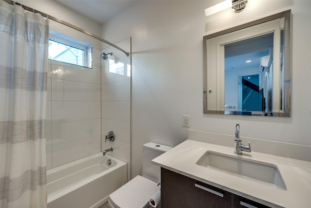 full bathroom with shower / bath combo, vanity, and toilet