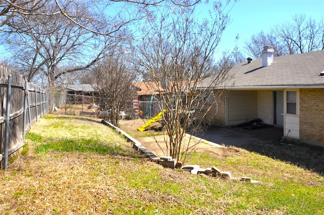 view of yard featuring a fenced backyard