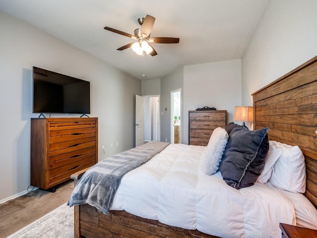 bedroom with baseboards, carpet, and a ceiling fan