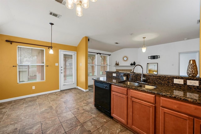 kitchen featuring visible vents, dishwasher, lofted ceiling, plenty of natural light, and a sink