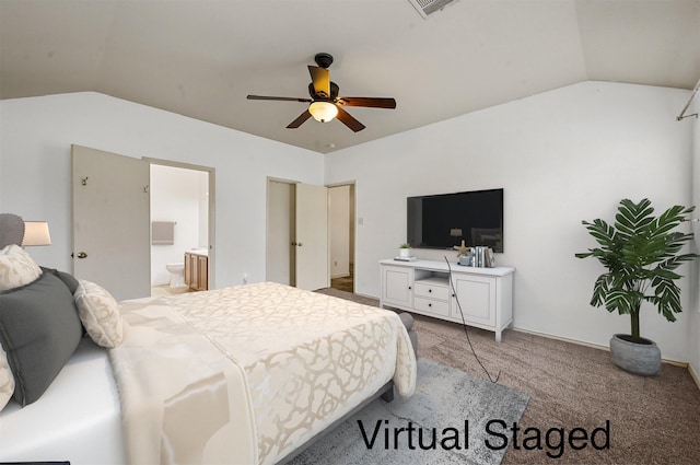 bedroom featuring visible vents, ceiling fan, light colored carpet, lofted ceiling, and ensuite bathroom