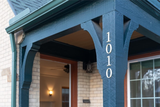 exterior details featuring brick siding