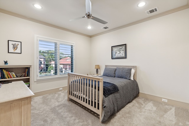 carpeted bedroom featuring recessed lighting, visible vents, ceiling fan, and ornamental molding