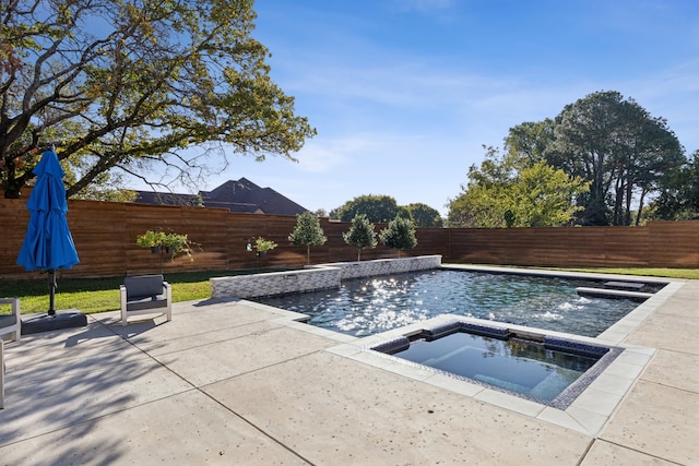 view of pool with a fenced in pool, a patio area, a fenced backyard, and an in ground hot tub