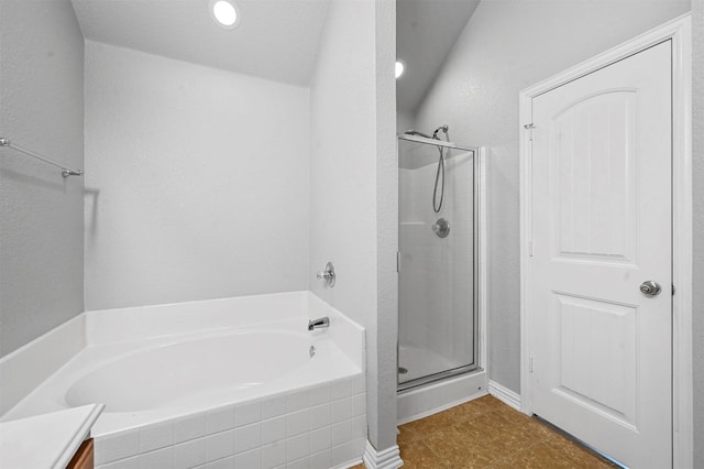 full bath featuring a shower stall and a bath